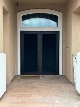 Bronze-toned Centurion security screen door built for secure ventilation