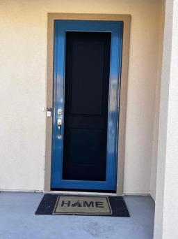 Home With Custom Blue Security Screen Door