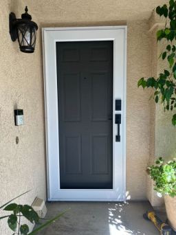 Home With White Security Door