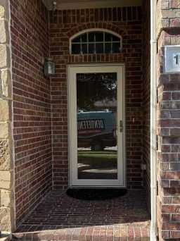 Glass Storm Doors in Sand Piper Beige