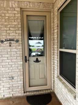 Glass Storm Doors in Chateau Finish