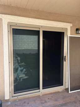 Beige Sliding Security Door Installed