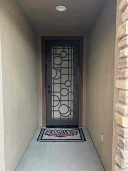 Decorative Gray Security Door Installed