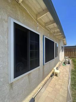 Security Screens With White Frame Installed