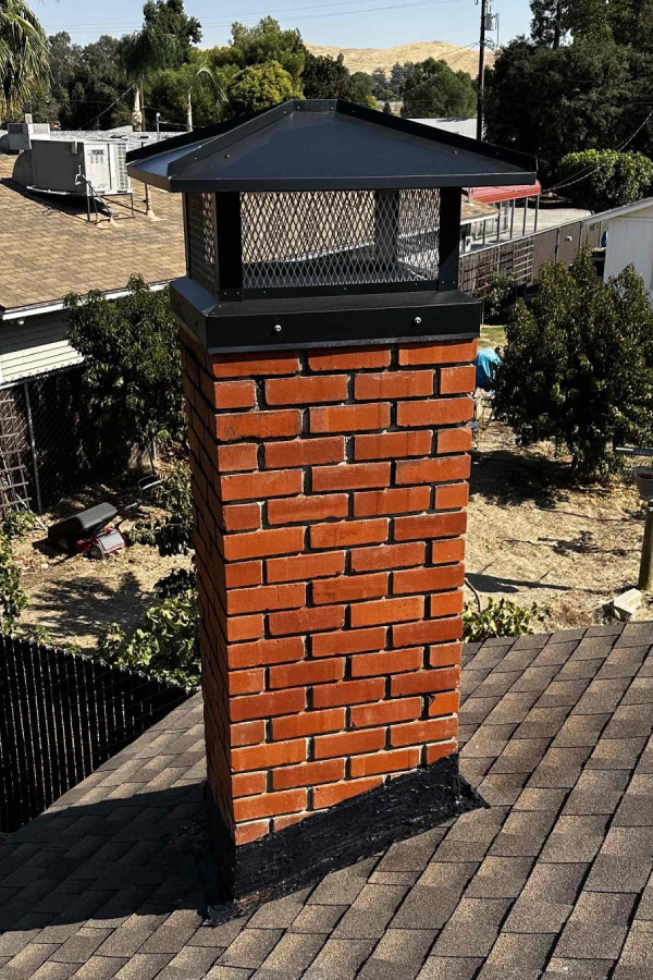 black-chimney-cap-chimney-repair-can-give-you-peace-of-mind-why-timely-chimney-repair-is-essential-for-home-maintenance-den-defenders