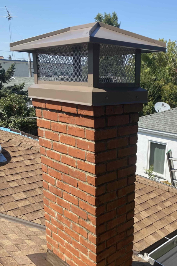 light-brown-brick-chimney-chimney-repairs-save-money-why-timely-chimney-repair-is-essential-for-home-maintenance-den-defenders