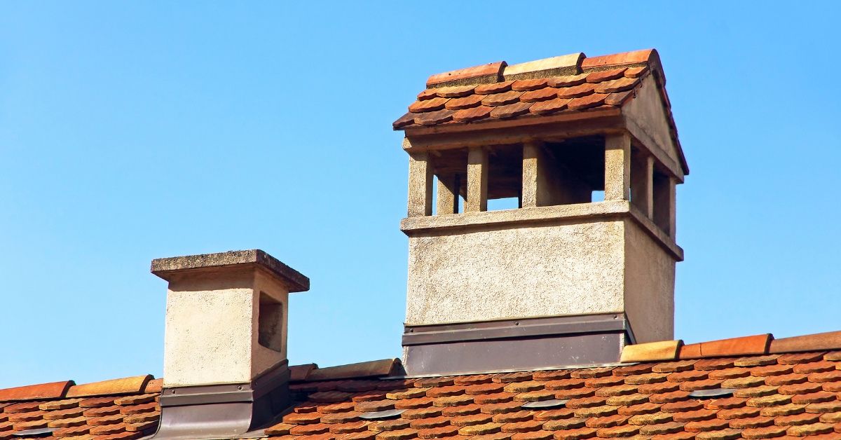 one-big-chimney-beside-small-chimney-in-one-roof-how-regular-chimney-sweep-keep-contra-costa-homes-safe