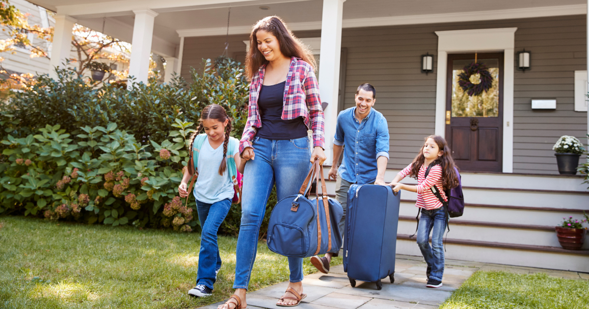 family leaving home for vacation home security tips to protect house while away